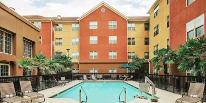 Outdoor pool at Homewood Suites By Hilton Shreveport.