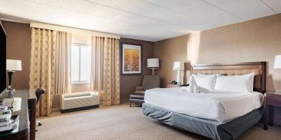 Bright and spacious day use room with work desk at Wyndham Omaha.