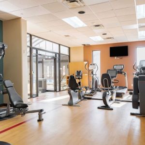 Well equipped fitness center at Wyndham Omaha.