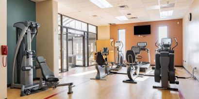 Well equipped fitness center at Wyndham Omaha.