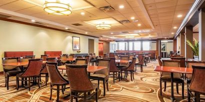 Dining area with comfortable seating at Wyndham Omaha.