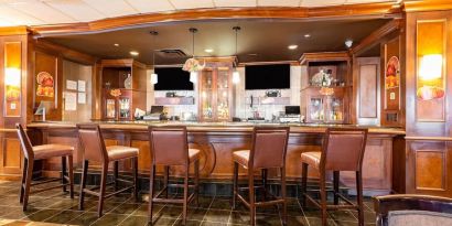 On-site bar and restaurant at Wyndham Omaha. 