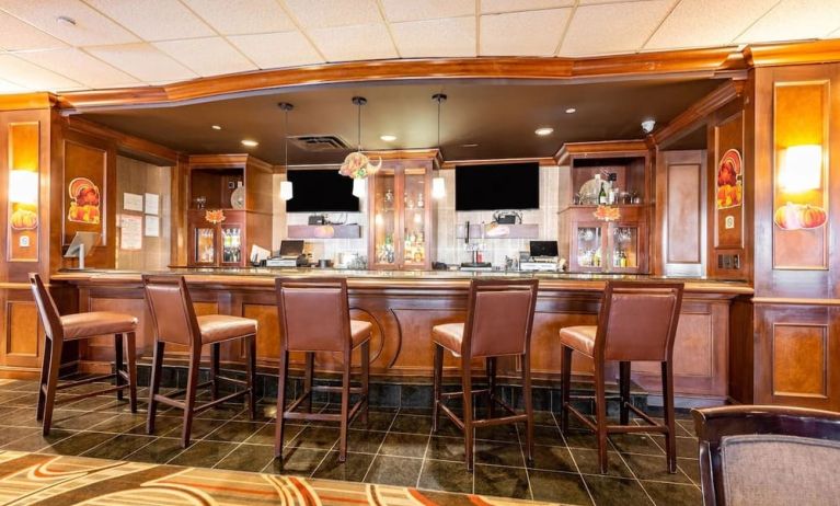 On-site bar and restaurant at Wyndham Omaha. 
