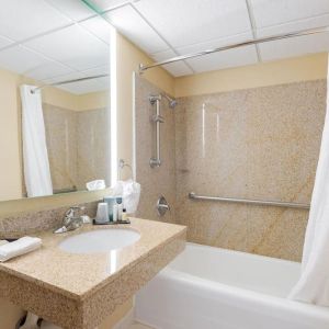 Private guest bathroom with free toiletries at Wyndham Omaha.