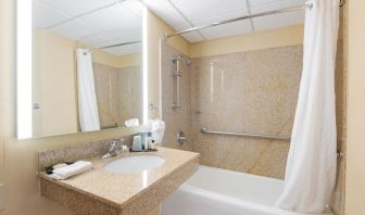 Private guest bathroom with free toiletries at Wyndham Omaha.