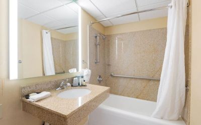 Private guest bathroom with free toiletries at Wyndham Omaha.