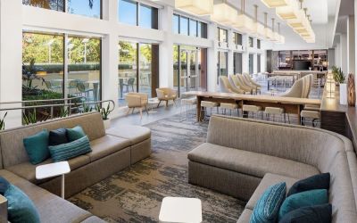 Lobby lounge seating and workspace at Element Miami International Airport.