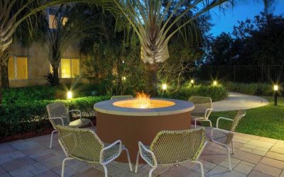 Outdoor lounge seating and fire pit at Element Miami International Airport.