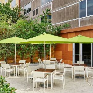 Hotel patio with seating at Element Miami International Airport.