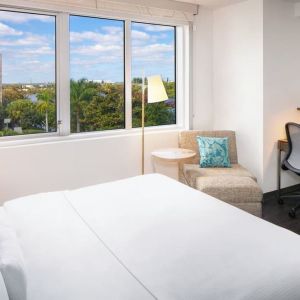 Day use room with work desk at Element Miami International Airport.