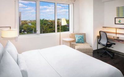 Day use room with work desk at Element Miami International Airport.