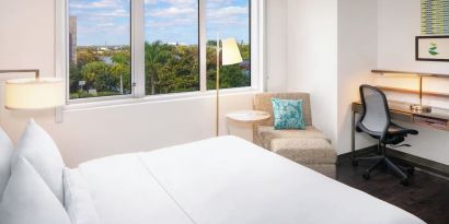 Day use room with work desk at Element Miami International Airport.