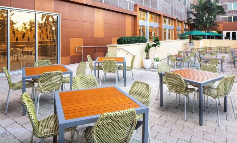 Outdoor dining area at Element Miami International Airport.