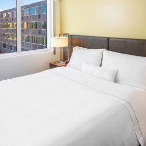 King bed at Element Miami International Airport.