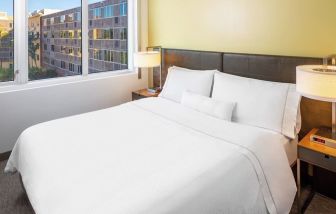 King bed at Element Miami International Airport.
