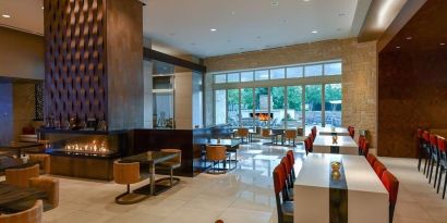 Dining area at Hilton Dallas/ Plano Granite Park.