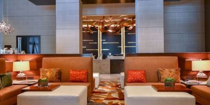 Lobby lounge seating at Hilton Dallas/ Plano Granite Park.
