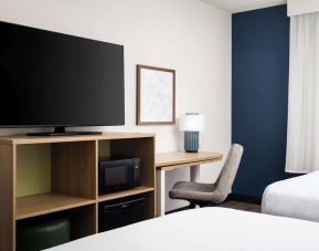 Day use room with queen beds and tv at Spark By Hilton Guelph.