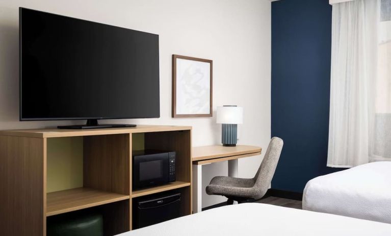 Day use room with queen beds and tv at Spark By Hilton Guelph.