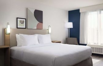 Day use room with king bed at Spark By Hilton Guelph.
