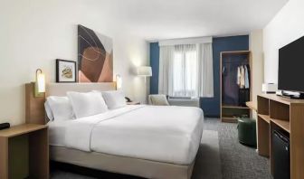 Day use room with king bed at Spark By Hilton Guelph.