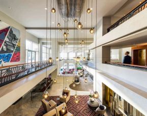 Lobby and coworking lounge at Pullman Miami Airport.