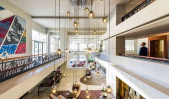 Lobby and coworking lounge at Pullman Miami Airport.