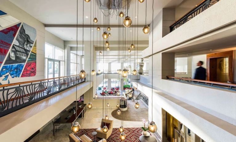 Lobby and coworking lounge at Pullman Miami Airport.