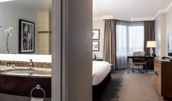 Day use room with work desk and private bathroom at Pullman Miami Airport.