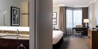 Day use room with work desk and private bathroom at Pullman Miami Airport.