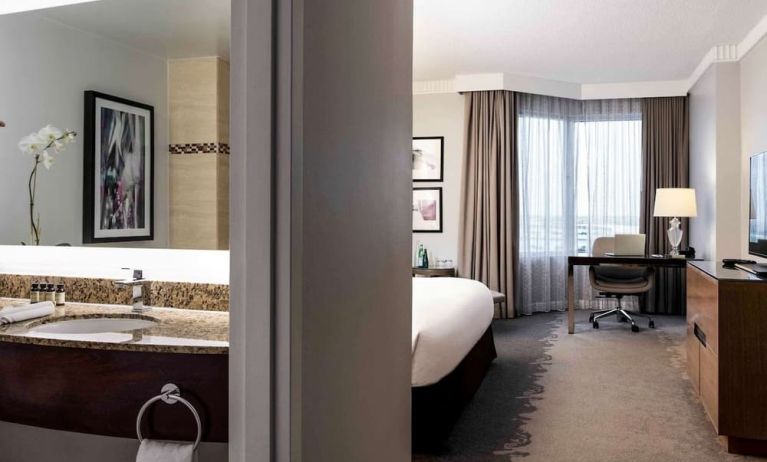 Day use room with work desk and private bathroom at Pullman Miami Airport.