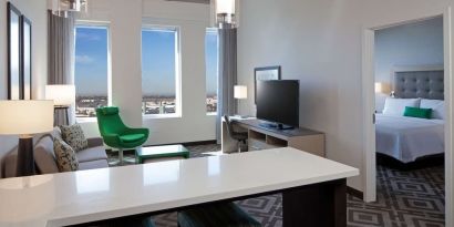 Day use room with living area at Homewood Suites By Hilton LAX Airport.
