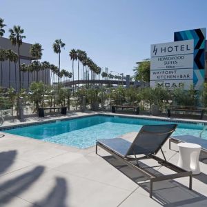 Refreshing outdoor pool at Homewood Suites By Hilton LAX Airport.