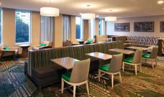 Dining area perfect for coworking at Homewood Suites By Hilton LAX Airport.
