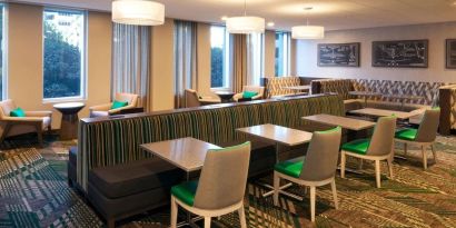 Dining area perfect for coworking at Homewood Suites By Hilton LAX Airport.
