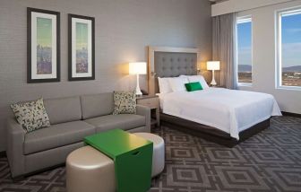 Day use room with sofa at Homewood Suites By Hilton LAX Airport.