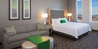 Day use room with sofa at Homewood Suites By Hilton LAX Airport.