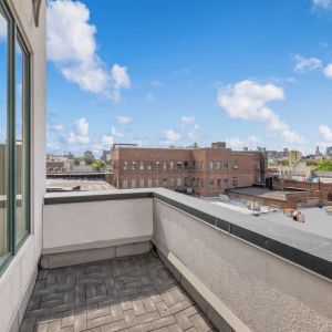 Outdoor patio at Aura Hotel Brooklyn.