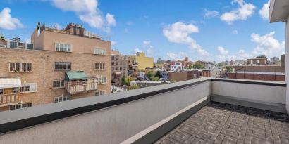 Outdoor patio at Aura Hotel Brooklyn.
