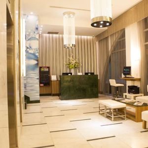 Hotel lobby and workspace at Wyndham Garden Brooklyn Sunset Park.