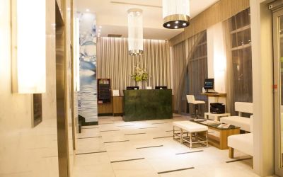 Hotel lobby and workspace at Wyndham Garden Brooklyn Sunset Park.