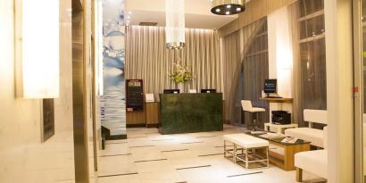 Hotel lobby and workspace at Wyndham Garden Brooklyn Sunset Park.