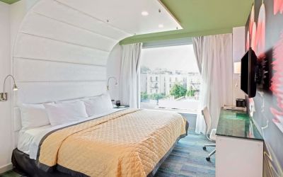 King room with comfortable bed and work desk at Wyndham Garden Brooklyn Sunset Park.