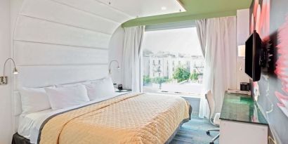 King room with comfortable bed and work desk at Wyndham Garden Brooklyn Sunset Park.