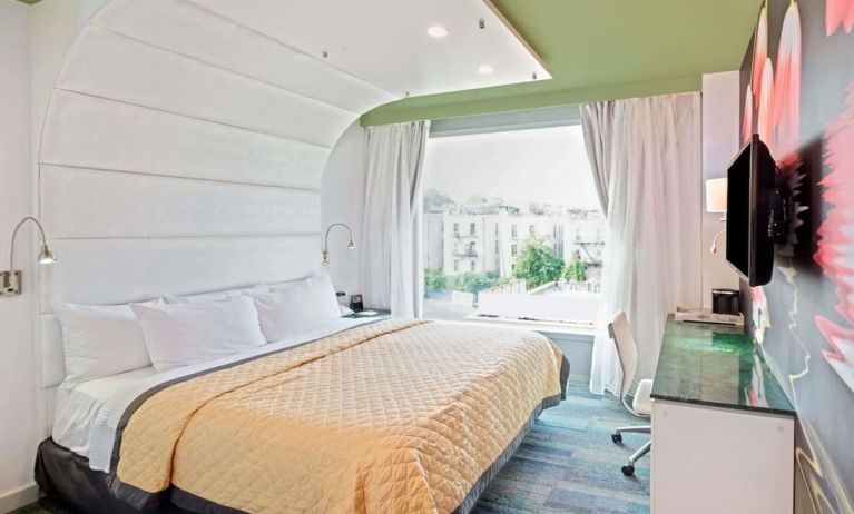 King room with comfortable bed and work desk at Wyndham Garden Brooklyn Sunset Park.
