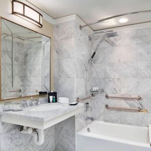 Private guest bathroom with shower and tub at The Westin Philadelphia.