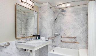 Private guest bathroom with shower and tub at The Westin Philadelphia.
