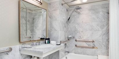 Private guest bathroom with shower and tub at The Westin Philadelphia.