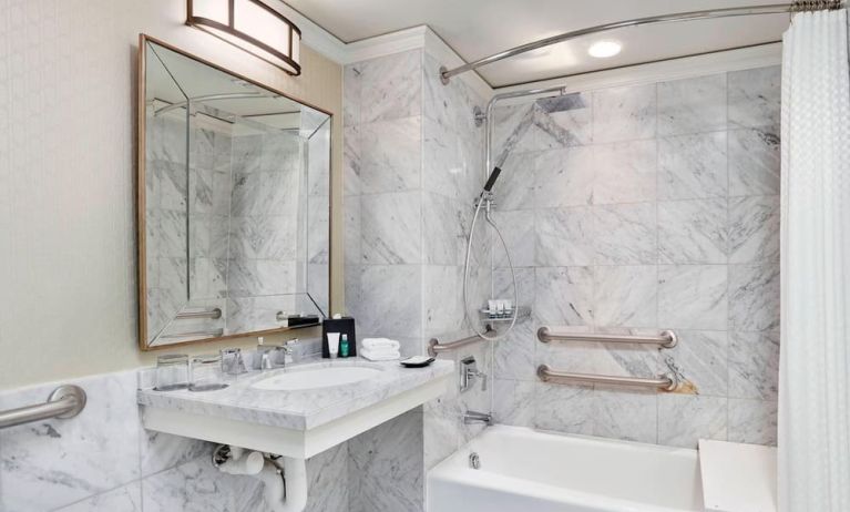 Private guest bathroom with shower and tub at The Westin Philadelphia.