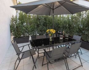 Outdoor terrace at Aiello Hotels - CityLife Apartments.